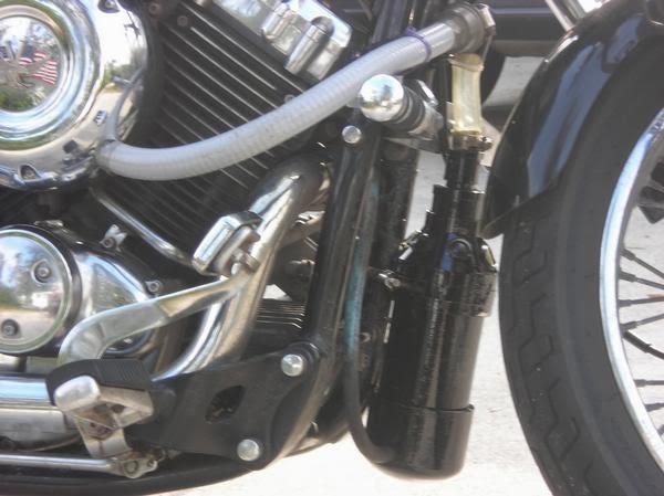 a motorcycle running very efficiently on gasoline fumes
